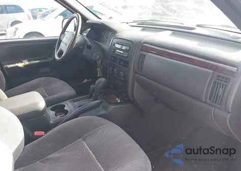 2000 Jeep Grand Cherokee Laredo из США, поврежденный, VIN 1J4GW48NXYC168947